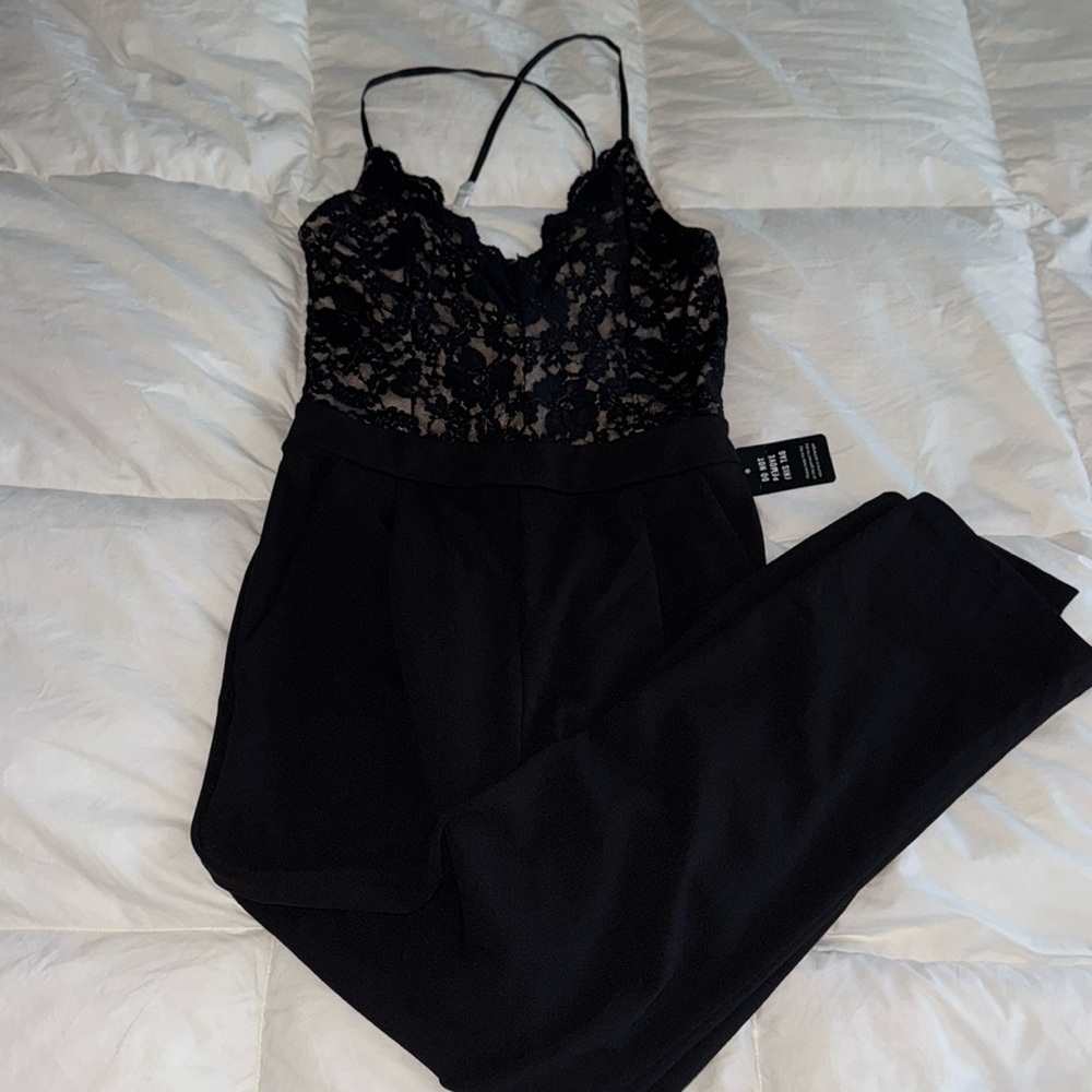 Beautiful lace top jumpsuit with nude underlay